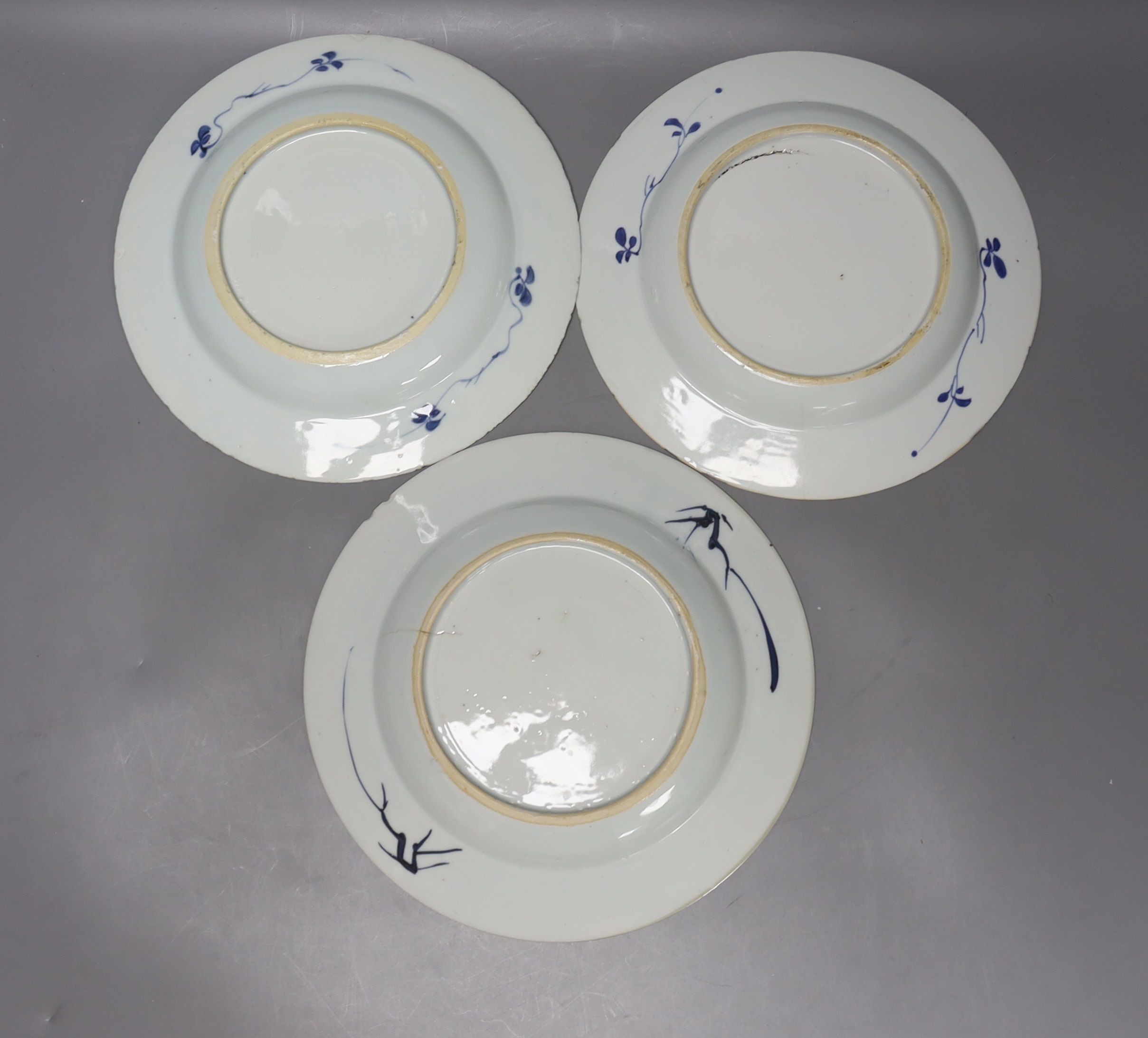 A pair of 18th century Chinese blue and white plates, together with two Chinese Imari dishes, all Kangxi period, largest 23cm